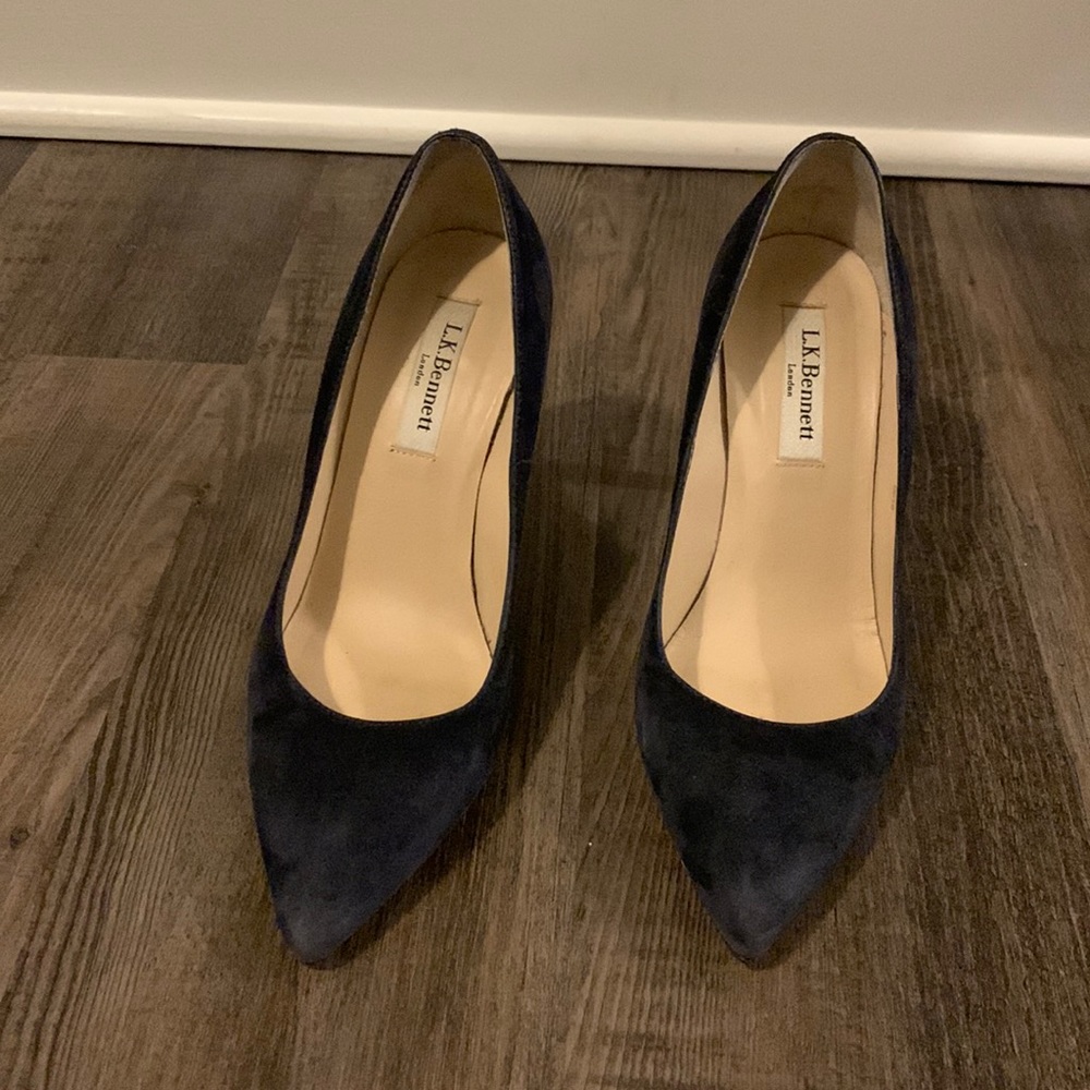 Black suede pumps